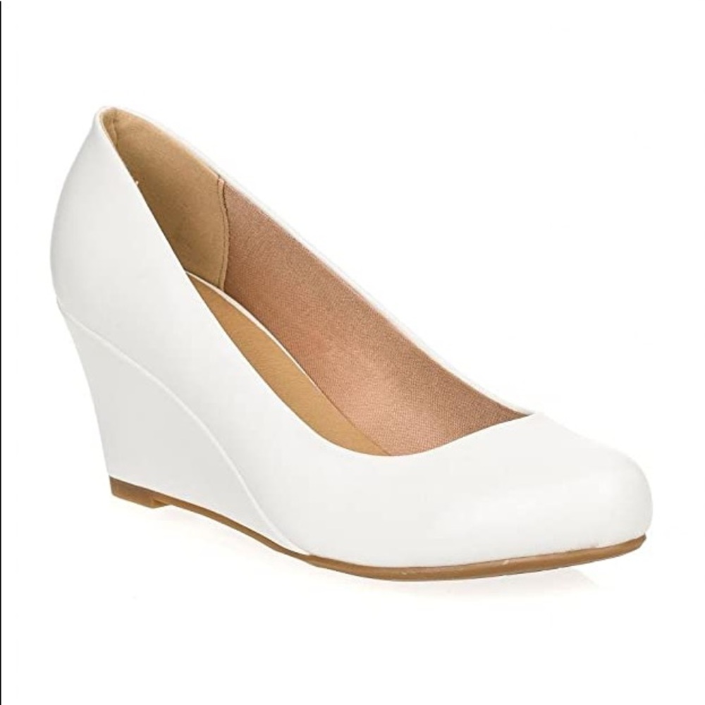 New in box white wedge pumps size 6